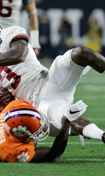 THE LATEST: Bama scores first on Henry's long TD run